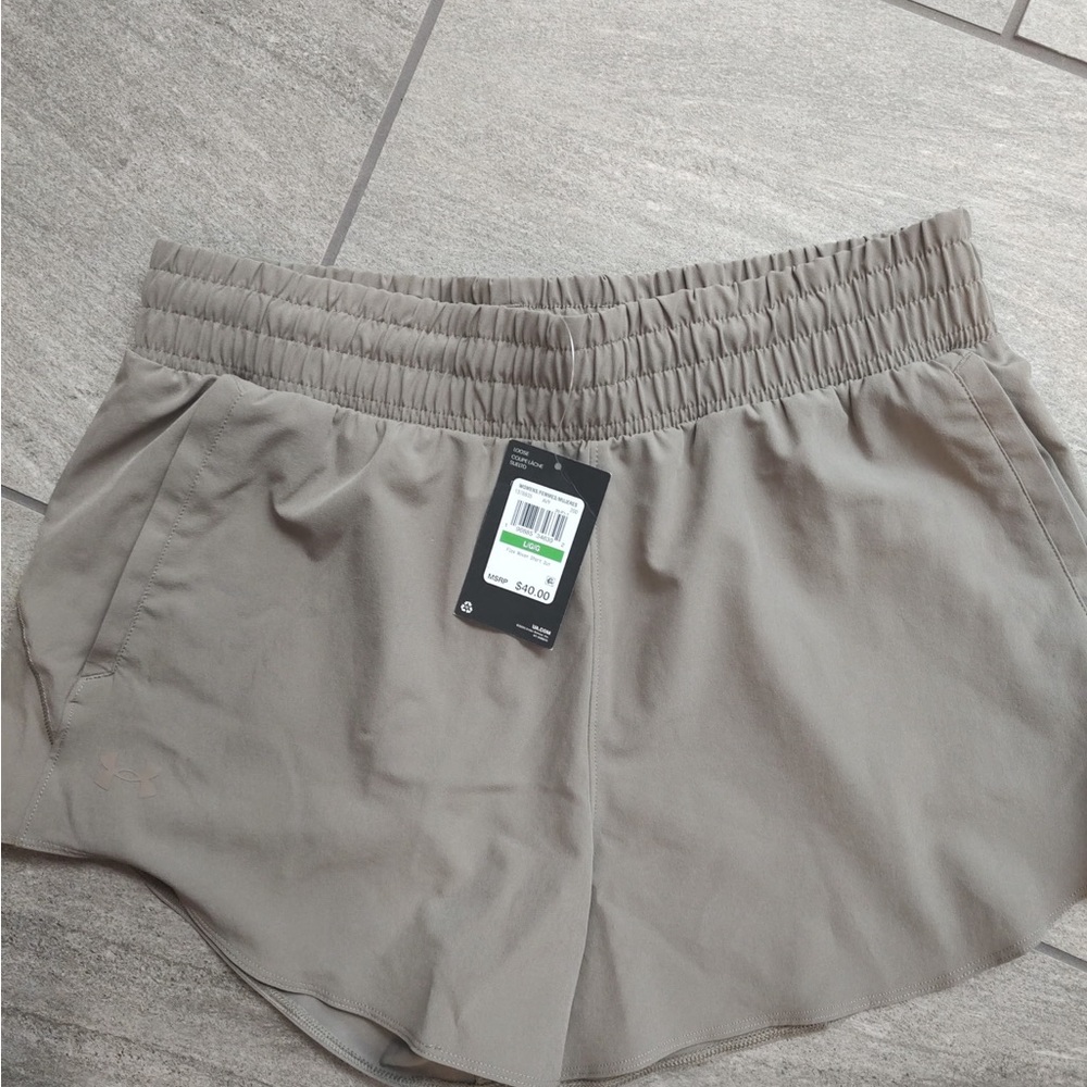 Women's Under Armour Taupe Shorts. Size large